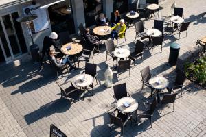 an overhead view of a patio with tables and chairs at Centrum Hotel in Akureyri