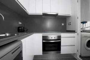 Η κουζίνα ή μικρή κουζίνα στο Apartamentos Sunway Talaia