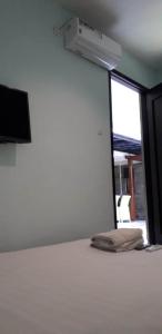 TV a/nebo společenská místnost v ubytování Shinta Guesthouse