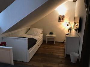 Postel nebo postele na pokoji v ubytování Wieko Ferienwohnungen - Luxus Pur im Prinz von Preußen