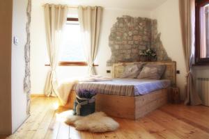 A bed or beds in a room at Al bosco incantato