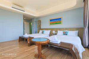 Postel nebo postele na pokoji v ubytování Pon Pon Wu Homestay