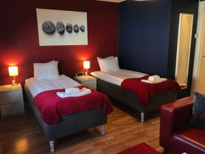 Letto o letti in una camera di Port Hotel