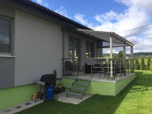 Vonkajšia záhrada v ubytovaní Apartmán Pod Klinom