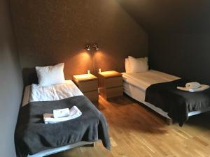 Letto o letti in una camera di Port Hotel