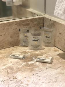 two toothbrushes sitting on top of a counter at Angra Praia Hotel in Fortaleza