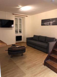 Posezení v ubytování Appartement face au Donjon