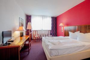 Postel nebo postele na pokoji v ubytování Interhotel Bohemia