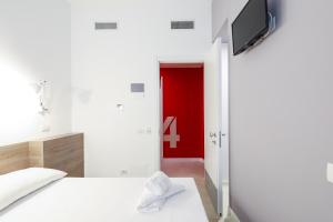 Кровать или кровати в номере bellaMI