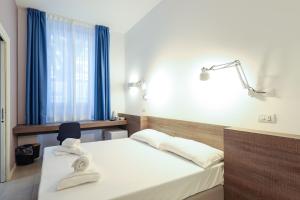 Кровать или кровати в номере bellaMI