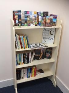 a book shelf filled with books at Lettoch Farm in Dufftown