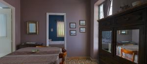 Кровать или кровати в номере VILA INSPIRATION - ON KINI BEACH