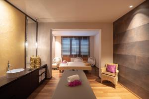 Voodi või voodid majutusasutuse Hotel & Spa Larimar toas