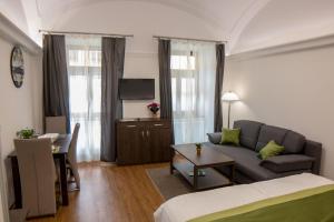 TV a/nebo společenská místnost v ubytování Mecset Apartman