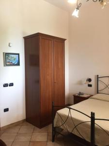 Postel nebo postele na pokoji v ubytování Agriturismo da Regina