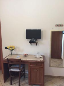 TV a/nebo společenská místnost v ubytování Agriturismo da Regina