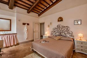Postel nebo postele na pokoji v ubytování Agriturismo CaseGraziani