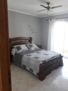 A bed or beds in a room at Villa Las Bahías