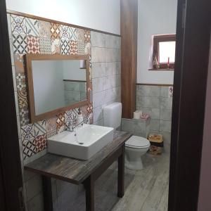 Koupelna v ubytování Casa Bunicilor