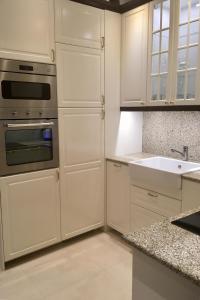 Kuchyňa alebo kuchynka v ubytovaní Villa la Val, Apartamenty Wałbrzych