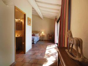 Ένα ή περισσότερα κρεβάτια σε δωμάτιο στο Le Clos des Cyprès Maison d'hôtes de charme - Diner Gourmet & Bien-être +62 φωτογραφίες