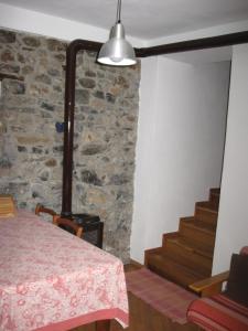 Ένα ή περισσότερα κρεβάτια σε δωμάτιο στο La Casetta