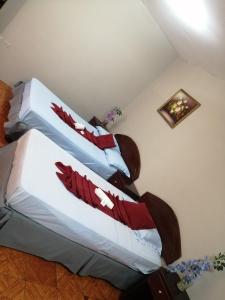 Cama o camas de una habitación en Hostal Los Mantas