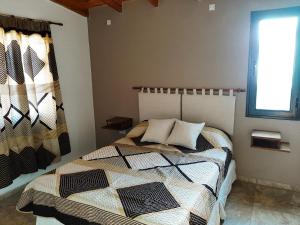 A bed or beds in a room at CABAÑAS SUKHA