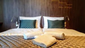 Postel nebo postele na pokoji v ubytování Hotel D1