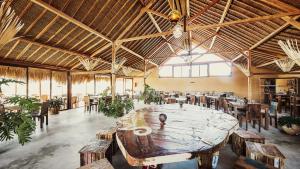 a large room with a large table and chairs at Westpoint Dakhla in Dakhla