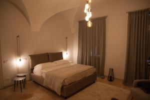 מיטה או מיטות בחדר ב-R&B Il Viavai