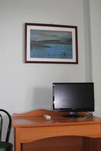 A television and/or entertainment centre at Agriturismo Silos Agri