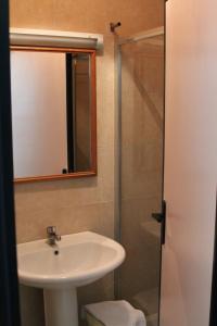a bathroom with a sink and a shower at Agriturismo Silos Agri in San Severo
