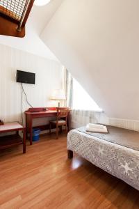 Postel nebo postele na pokoji v ubytování Humala Guest House