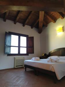 Postel nebo postele na pokoji v ubytování Hotel Punta Moros