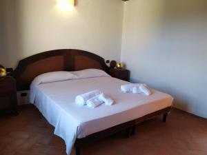 Postel nebo postele na pokoji v ubytování Hotel Punta Moros