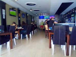 TV a/nebo společenská místnost v ubytování HOSTEL "ARCO"