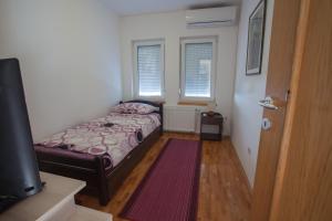 Postel nebo postele na pokoji v ubytování Guesthouse Rota