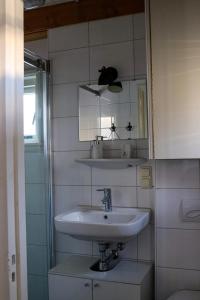 Ett badrum på Mini appartement De Fabriek