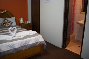 Voodi või voodid majutusasutuse Pacha Suite toas