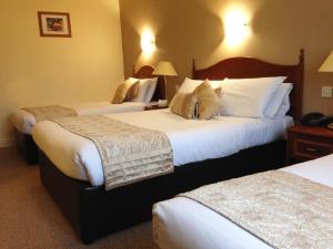 Ліжко або ліжка в номері Hotel Curracloe