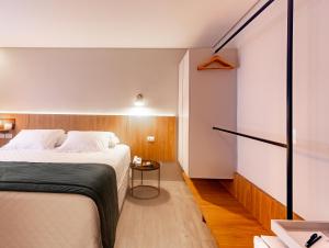 Postel nebo postele na pokoji v ubytování Hotel Melo