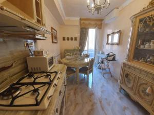 Kuchyň nebo kuchyňský kout v ubytování FD Luxury rooms