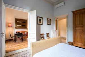 Letto o letti in una camera di Flat Three