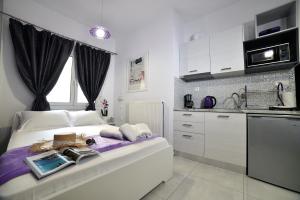 A kitchen or kitchenette at Central Athens Studios
