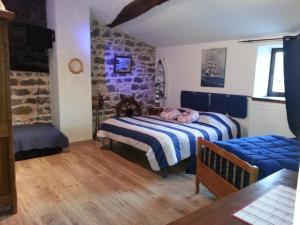 Postel nebo postele na pokoji v ubytování Château des Aiguilles