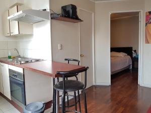Gallery image of Departamento Paseo Bulnes Metro La Moneda in Santiago +78 photos