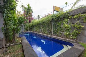 Πισίνα στο ή κοντά στο Bali Aman Darling House