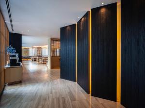 Kuchyň nebo kuchyňský kout v ubytování Arize Hotel Sri Racha