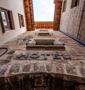 a hotel sign on the floor of a building at Hotel Jaime I in Mora de Rubielos